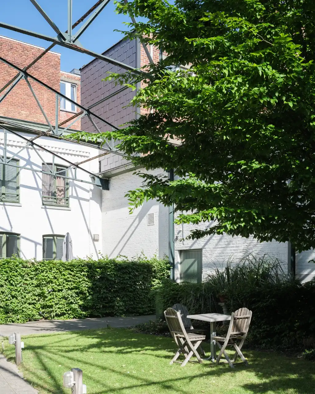 Bijzondere eigendom gelegen in een voormalige industriële katoenspinnerij. foto 10