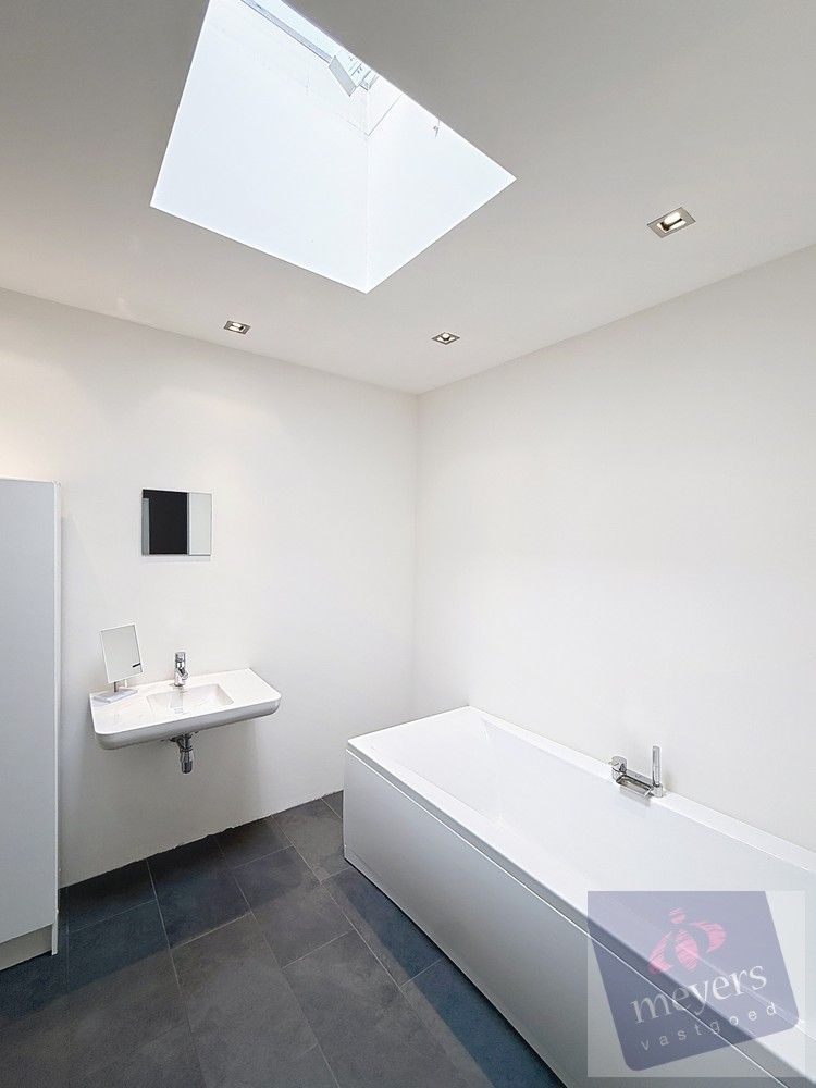 Handelspand met woonst op toplocatie in Spalbeek (Hasselt) foto 25