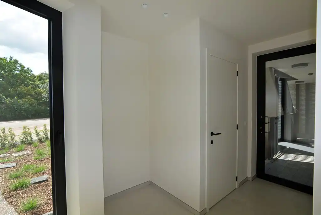 Gelijkvloers nieuwbouwappartement 124 m² met 2 slpk, tuintje en 2 autostandplaatsen. foto 18