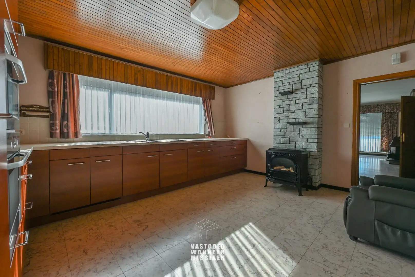 Te renoveren gelijkvloerse woning met  3slpk, garage, tuin op 1290m2 foto 13