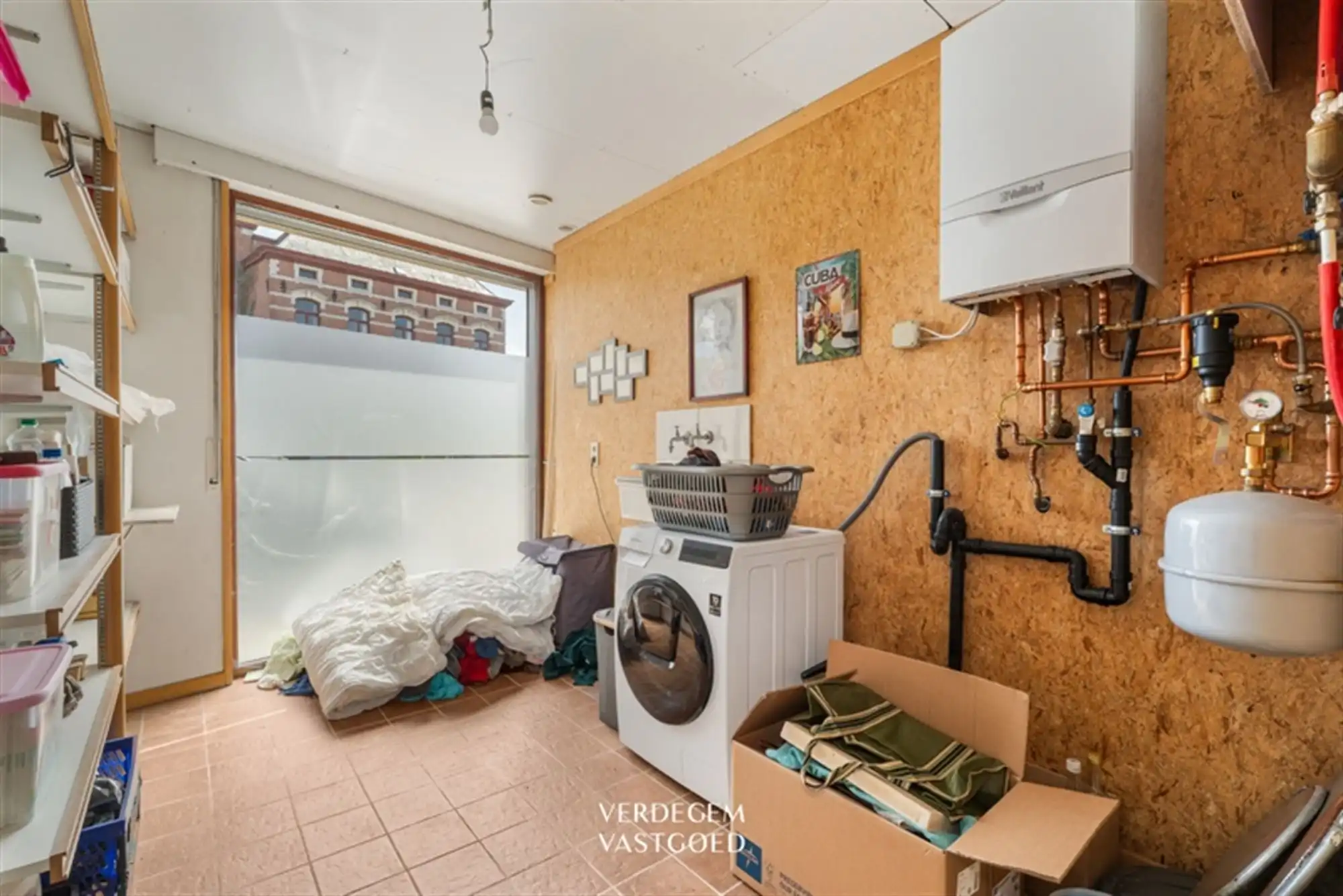 Opbrengsteigendom met 2 appartementen en 4 garages in het centrum van Sleidinge  foto 13