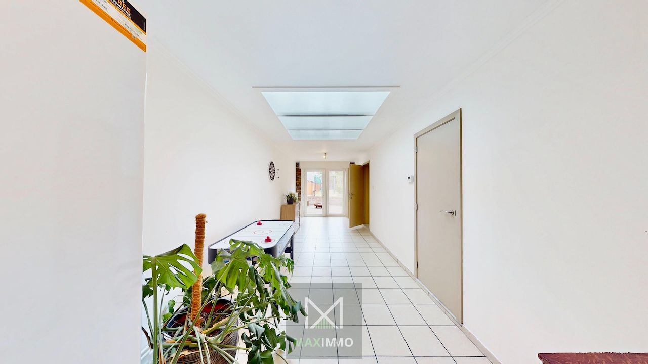 Instapklare gezinswoning met diepe tuin in Menen – Ruimte, licht & comfort foto 9