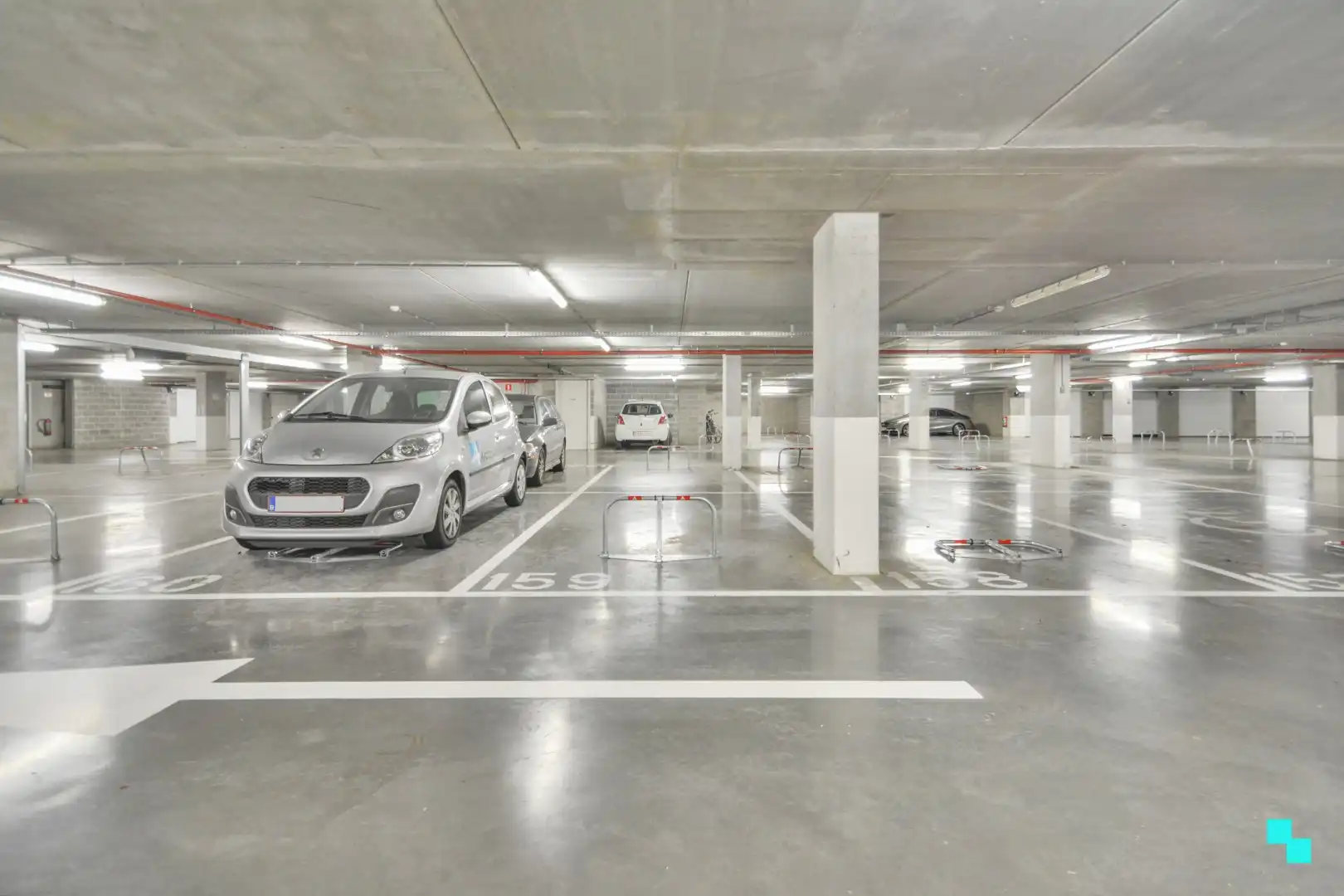 Parkeerplaatsen in een afgesloten parkeerkelder op een toplocatie in Merelbeke. foto 7