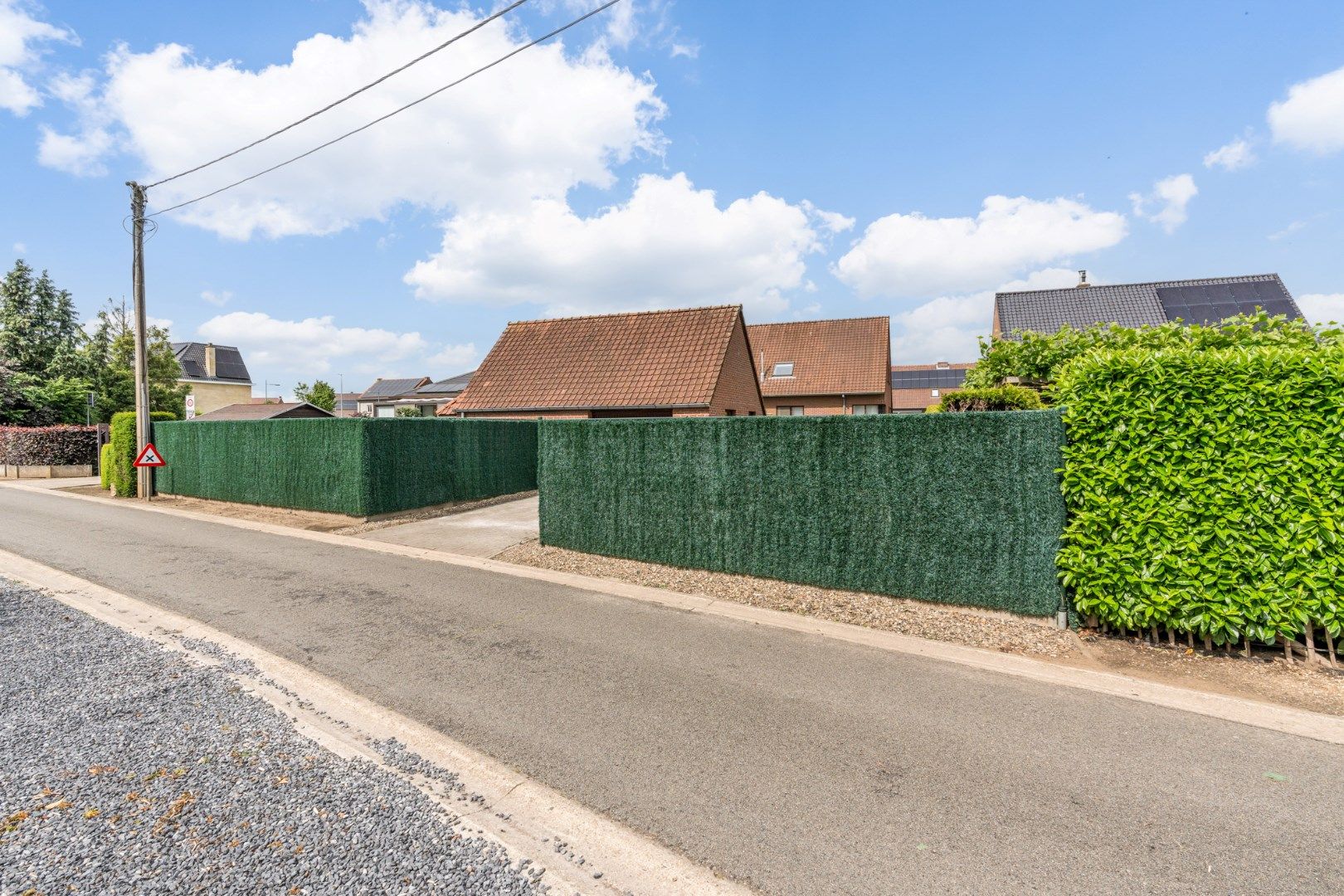 Comfortabel gebouw, onderverdeeld in een gelijkvloers appartement en een woning (210 + 210A), op een perceel van 9a60 met diverse mogelijkheden (kangoeroewoning foto 38