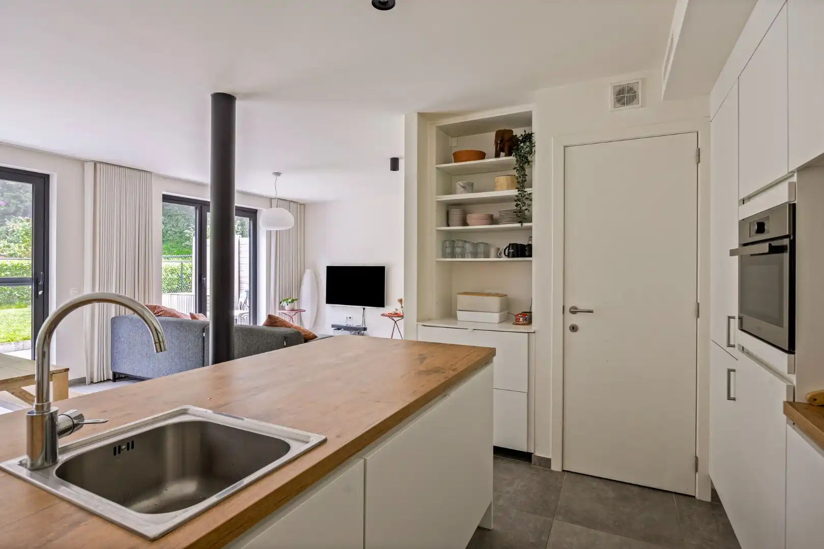 Ruim appartement met 2 slaapkamers en tuin + autostaanplaats vlakbij autostrade - EPC 68 kWh/m²  foto 13
