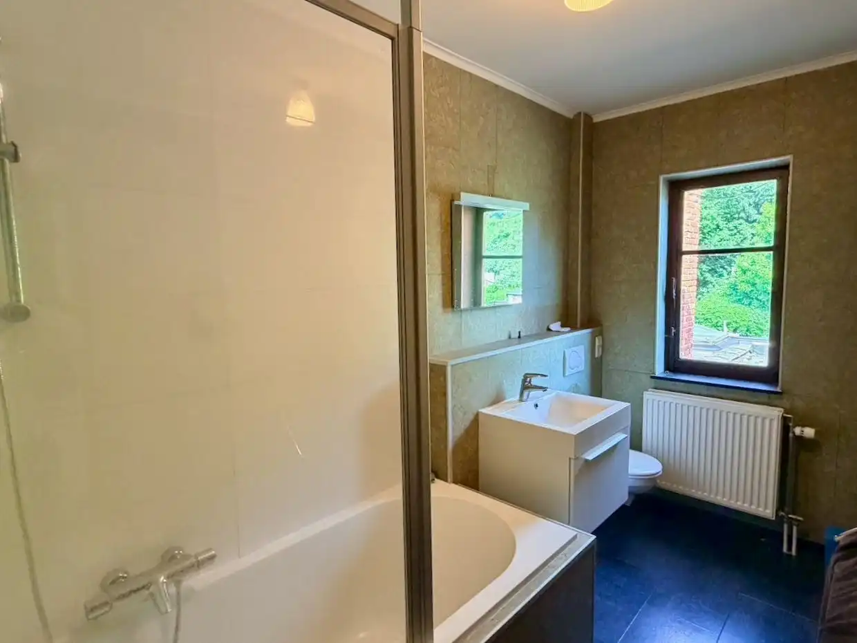 Ruime rijwoning met 4 slaapkamers, garage en tuin op toplocatie in Heverlee foto 16