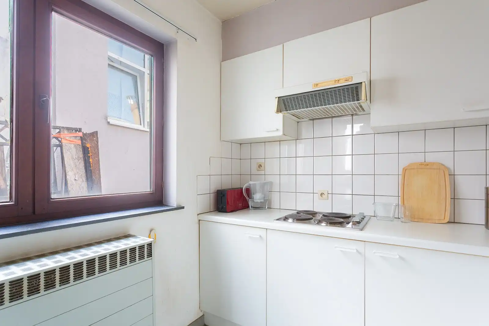 Te renoveren stadswoning met garage en tuin foto 9