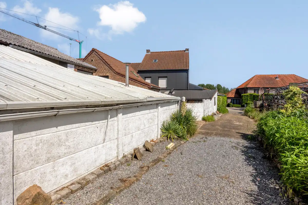 RUSTIG GELEGEN WONING MET ZORGWONING OP CA 15A TE BORGLOON. foto 37