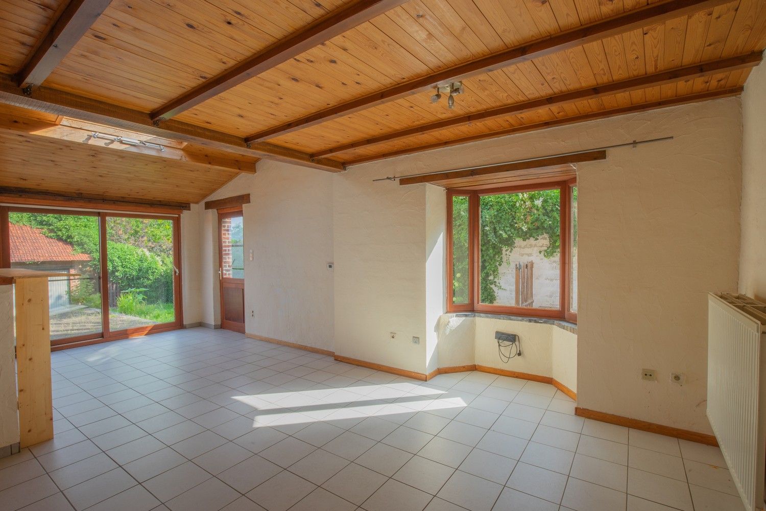 Hoofdfoto van de publicatie: Charmante halfopen woning met 3 slaapkamers, ruime garage en gunstige ligging in Holsbeek