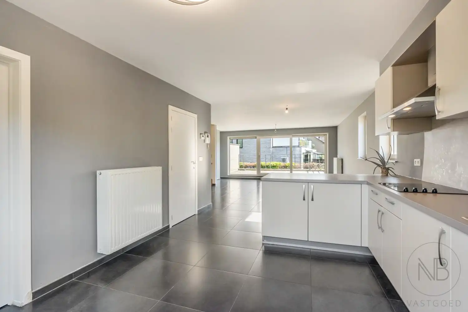 Ruim duplex appartement met 3 slaapkamers en groot terras in hartje Zutendaal foto 4