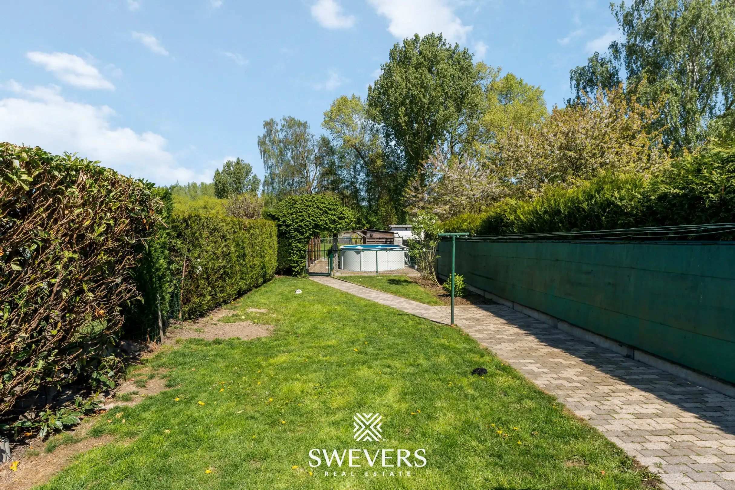 Instapklare, volledig gerenoveerde rijwoning met 3 slaapkamers en ruime tuin in Wellen foto 23