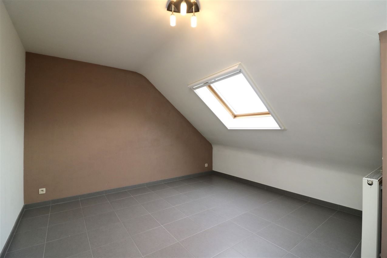 Duplex-appartement met 2 slpk., terras, autostaanplaats in centrum foto 16