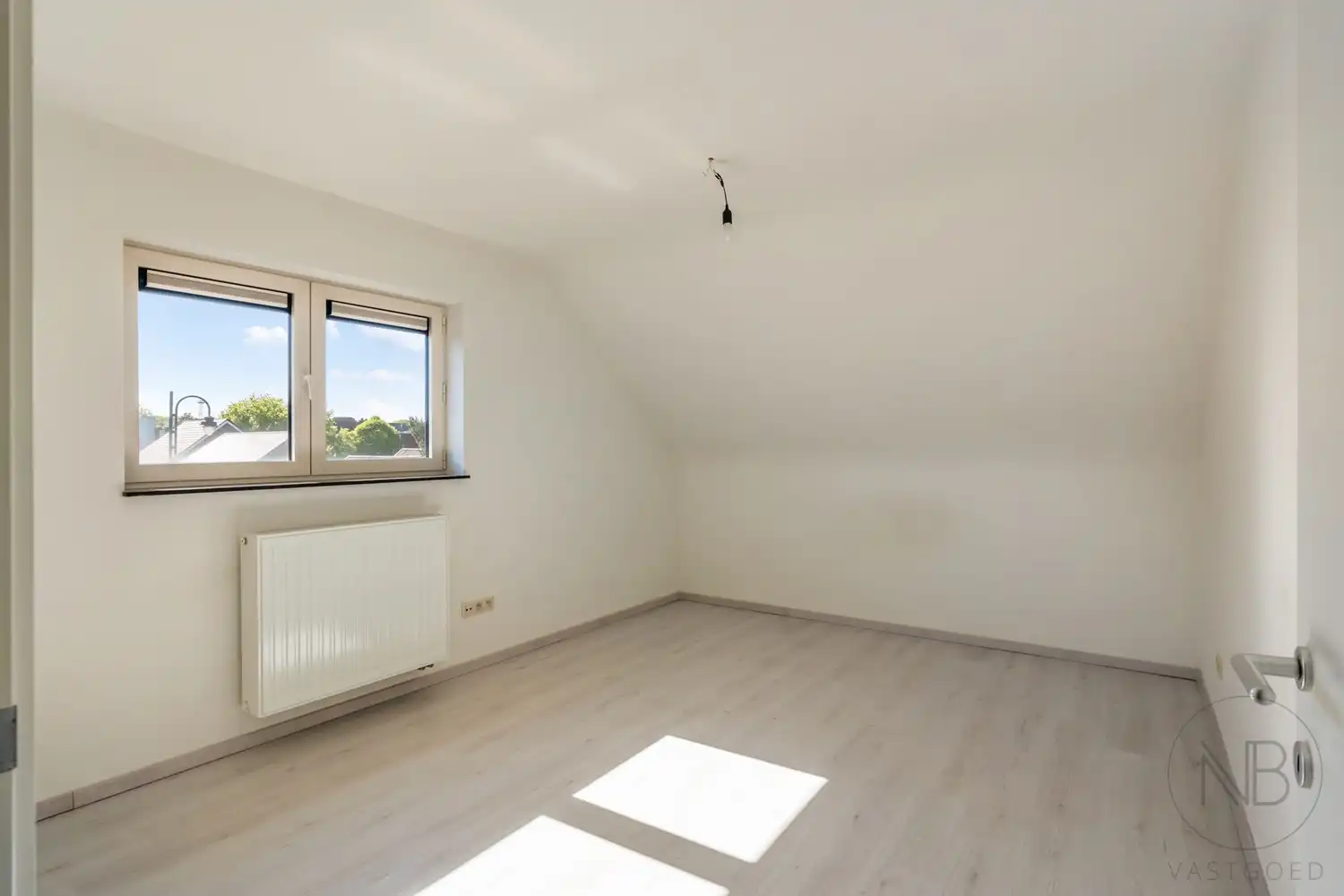 Ruim duplex appartement met 3 slaapkamers en groot terras in hartje Zutendaal foto 17
