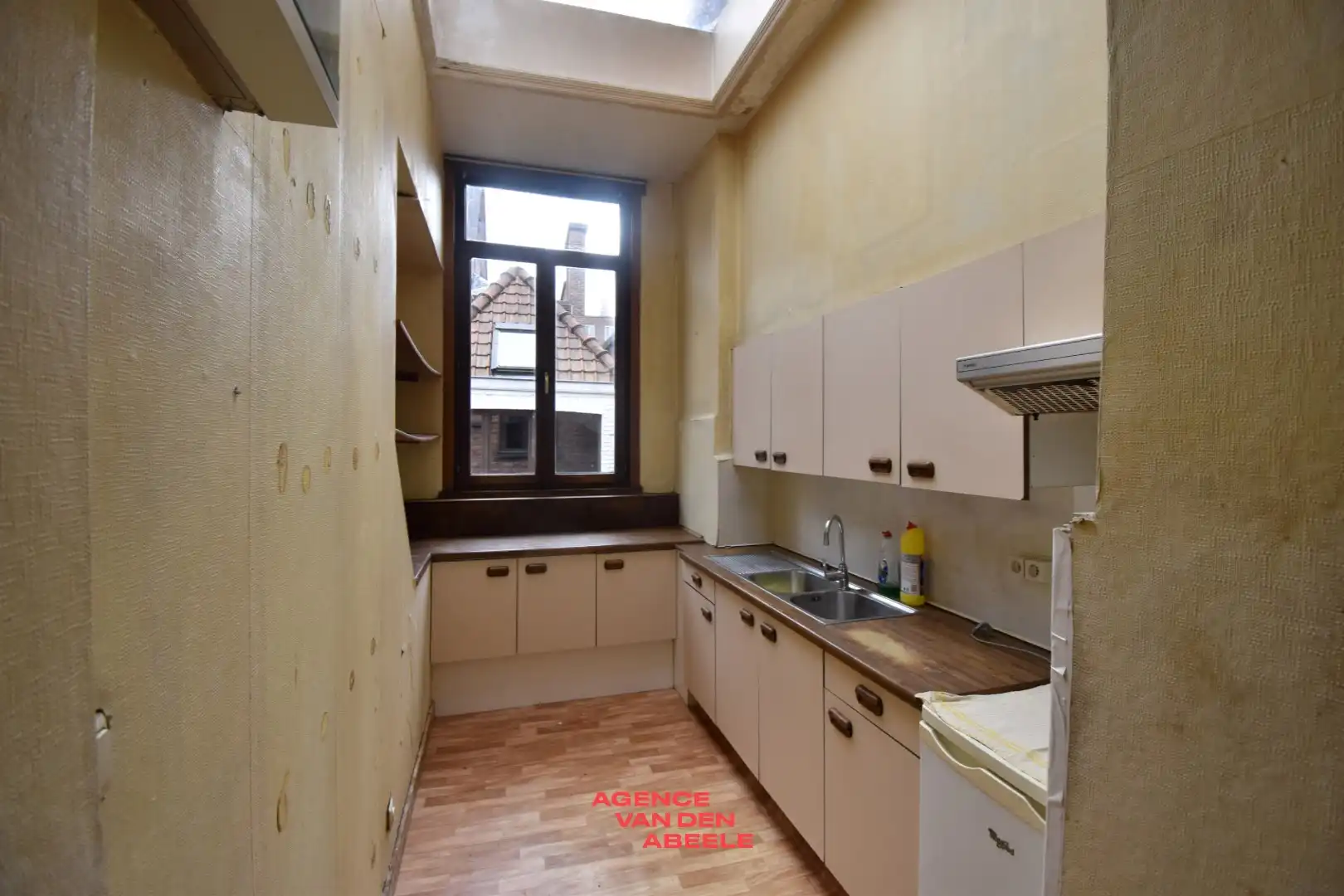 Winkelruimte met woonst in de Brugse binnenstad. foto 14