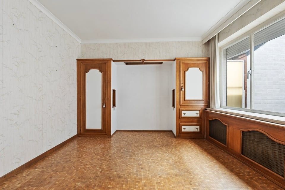 TE RENOVEREN APPARTEMENT MET 2 SLKS IN HET CENTRUM VAN SINT-TRUIDEN foto 10