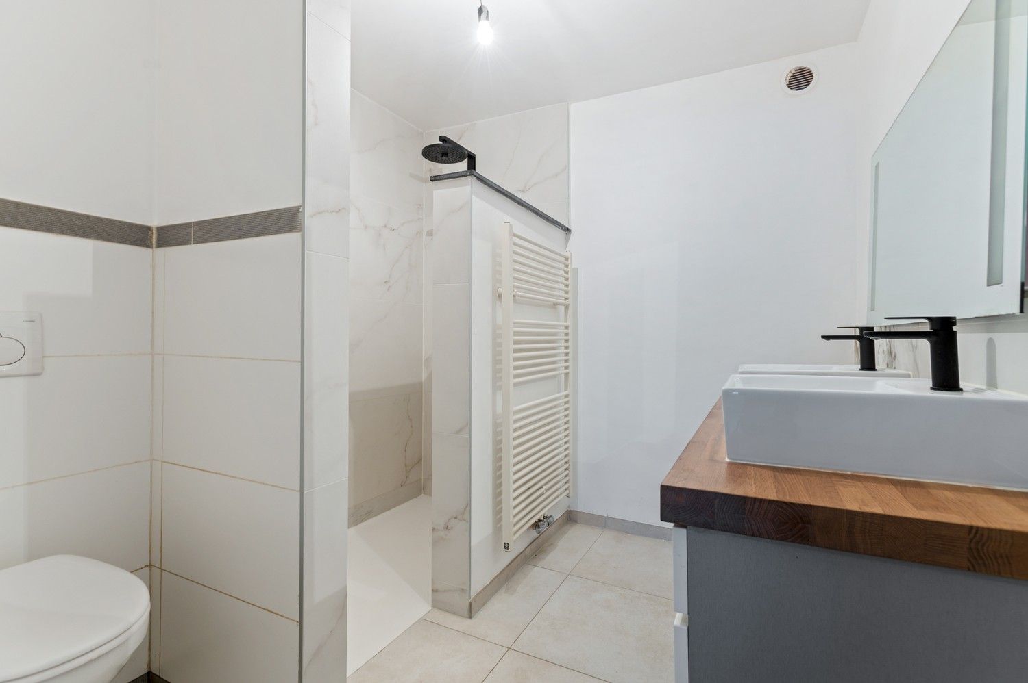 Ruim gelijkvloersappartement met 2 slpk en terras foto 10