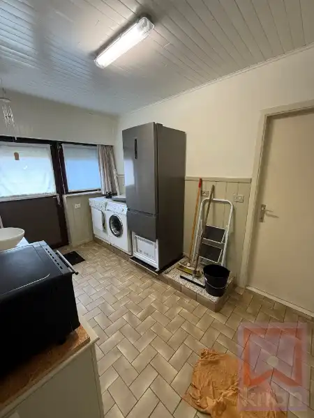 Ruime gelijkvloerse woning met 3 slaapkamers, zolderverdieping en garage op 1.340 m² foto 11