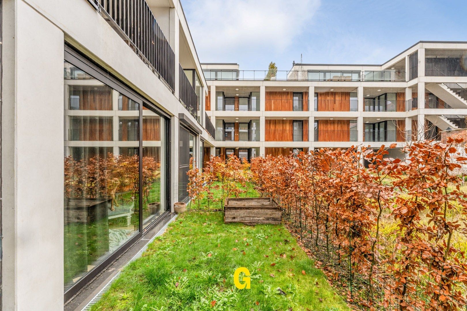 Recent gelijkvloersappartement met 2 slaapkamers, terras, voor- en achtertuin, standplaats en extra ruime berging in hartje Hoeselt foto 9