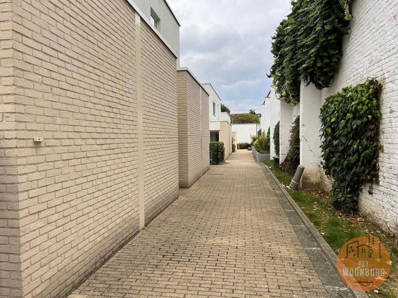 Gelijkvloersappartement met tuin, kelder en parkeerplaats foto 13