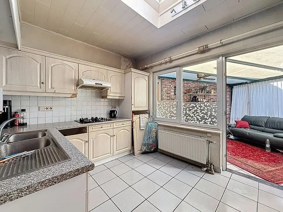 Ruime gezinswoning met diepe tuin in centrum Wuustwezel foto 8