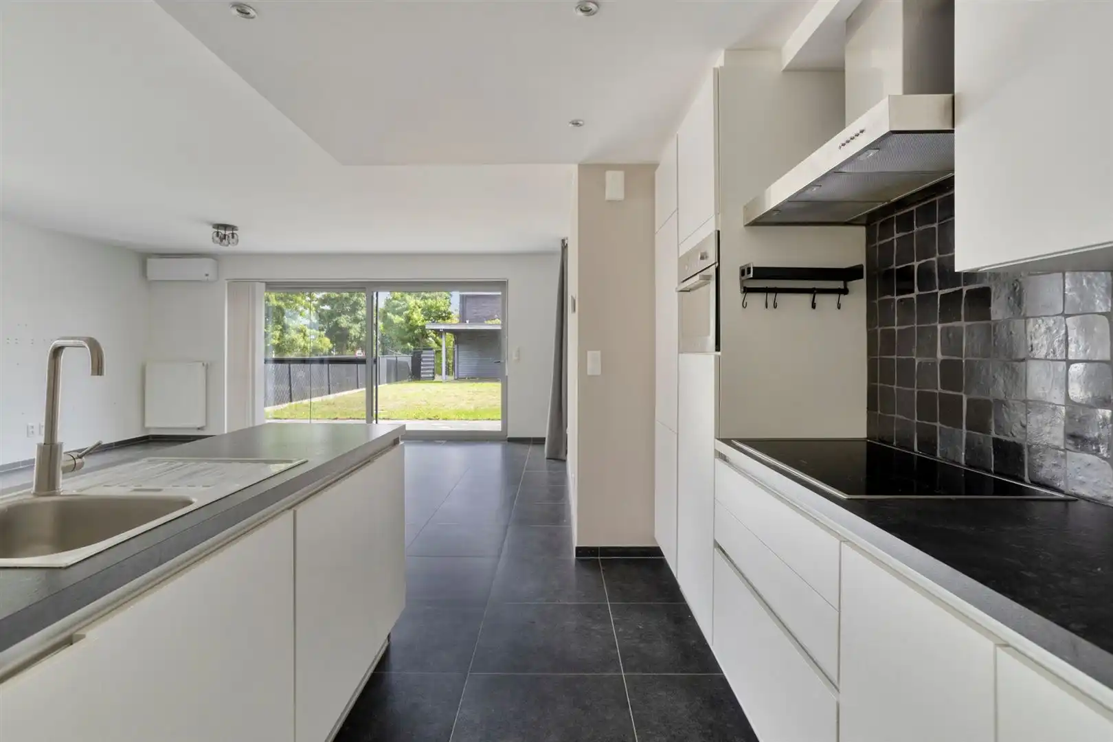 TE KOOP: Instapklare recente woning met 3 slaapkamers te Meldert! foto 11