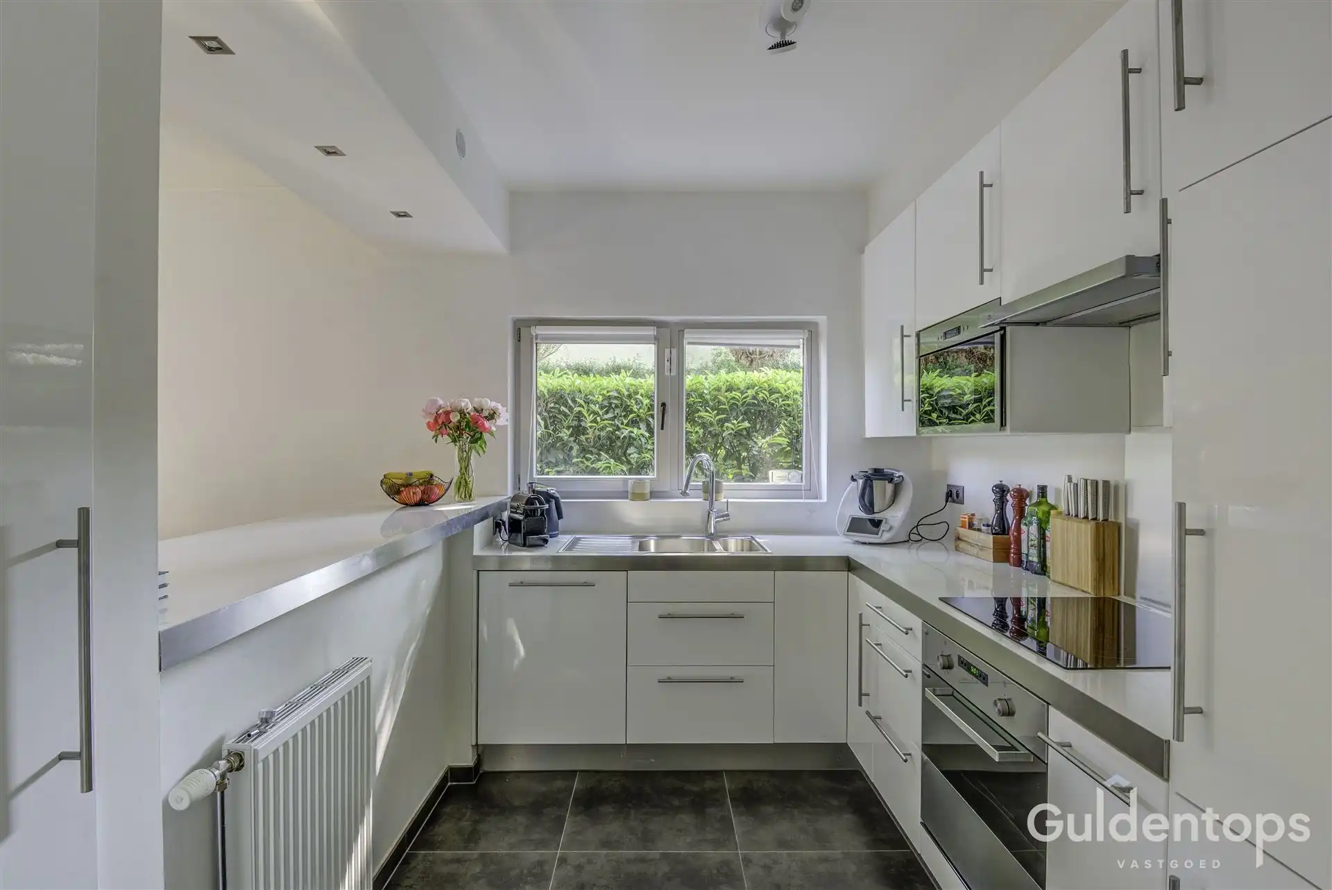 Modern ruim gelijkvloers (2 slk) appartement met ruime tuin foto 11