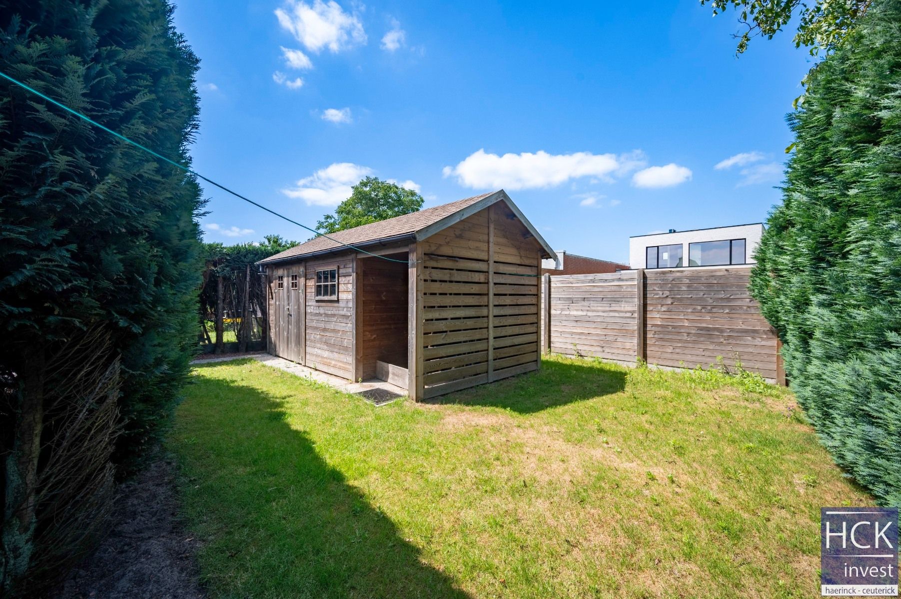 DEINZE - Alleenstaande villawoonst met 3 SLPK, tuin en garage foto 12