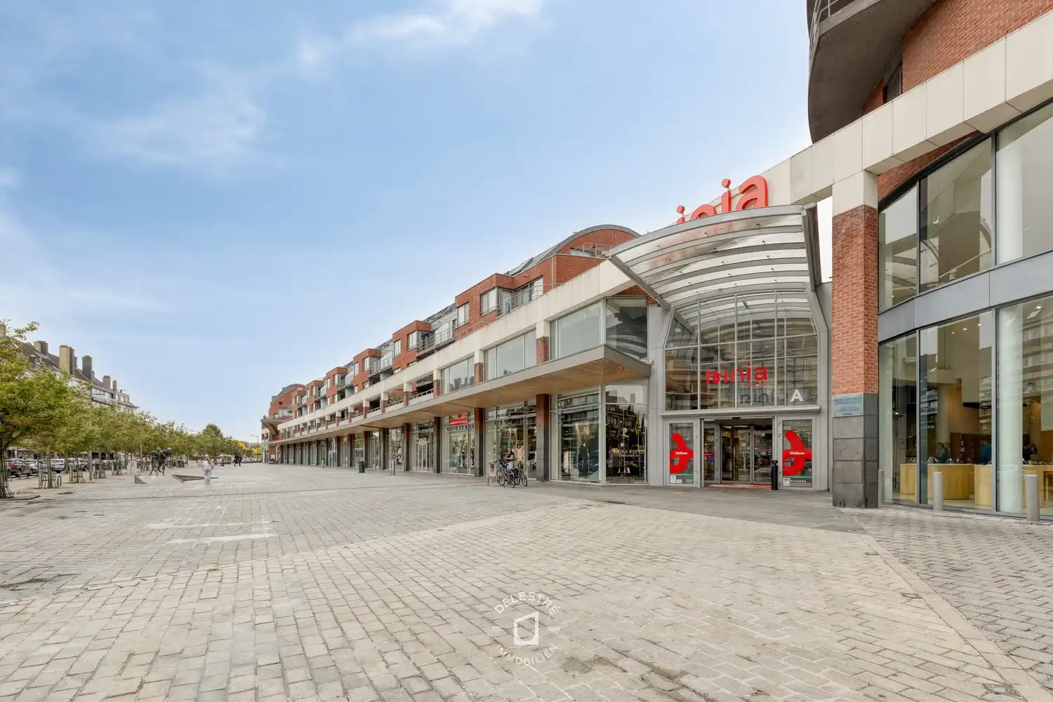 Topgelegen commercieel gelijkvloers op zichtlocatie recht tegenover Ninia Shopping Center foto 6