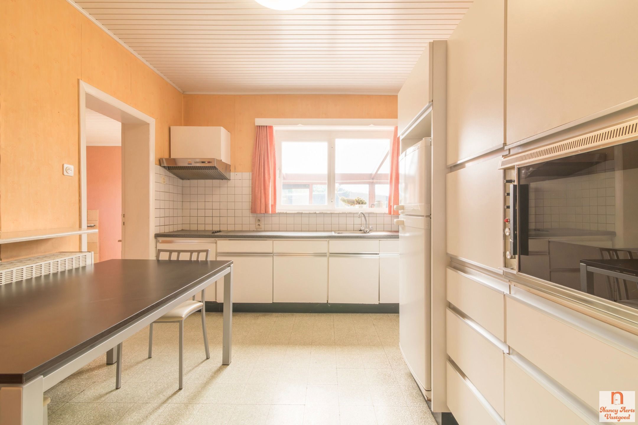 Charmante woning met grote tuin en renovatiemogelijkheden foto 14
