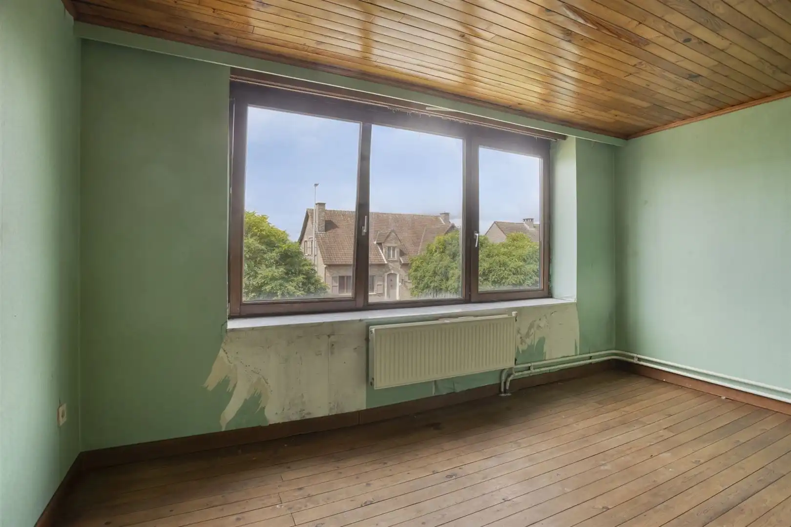 TE KOOP: Te renoveren woning op een perceel van 11a33ca! foto 18