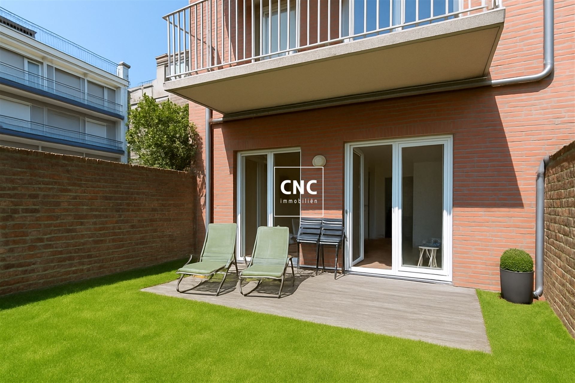 Gelijkvloers appartement met zonnige tuin nabij het centrum
 foto 12