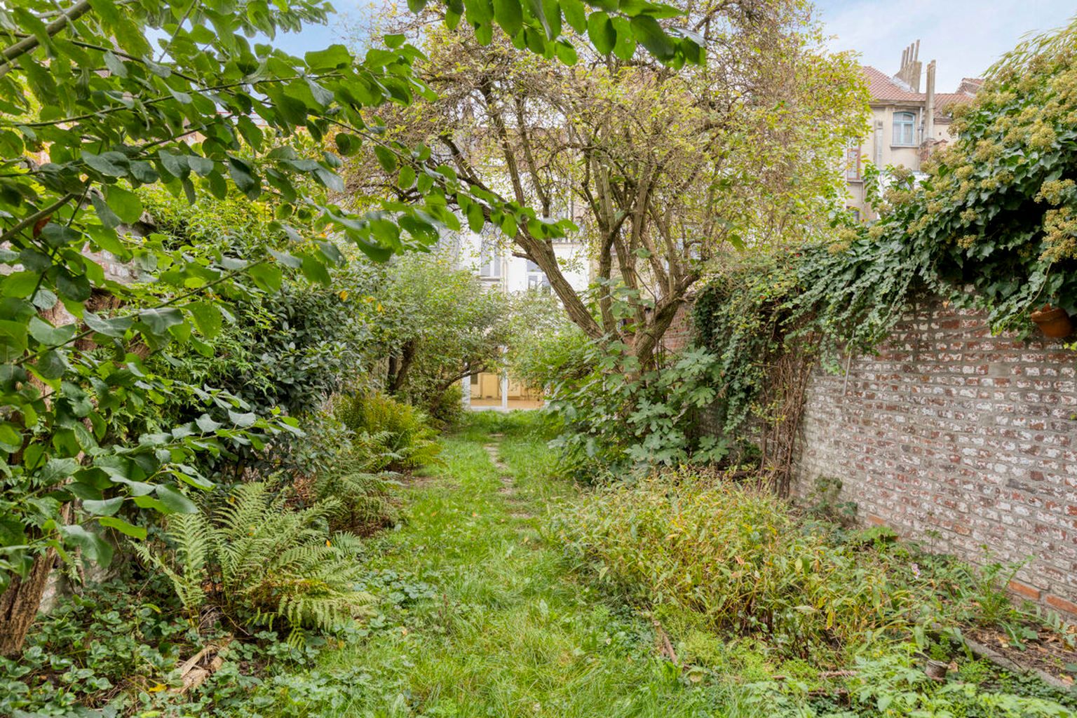 Te renoveren herenhuis met tuin nabij Sint-Guidoplein foto 21
