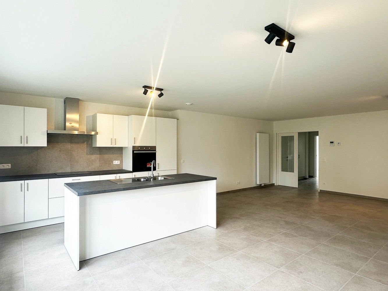 Prachtig ruim gelijkvloers appartement met 4 slaapkamers & tuin in Lier! foto 4