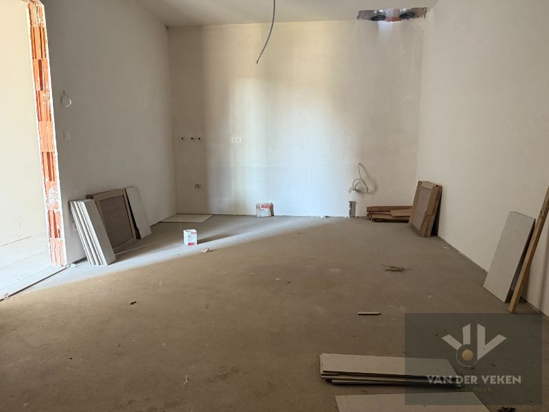 Ruime half open BEN-woning met 4 slaapkamers te bewonderen in het gezellige Kermt. foto 10