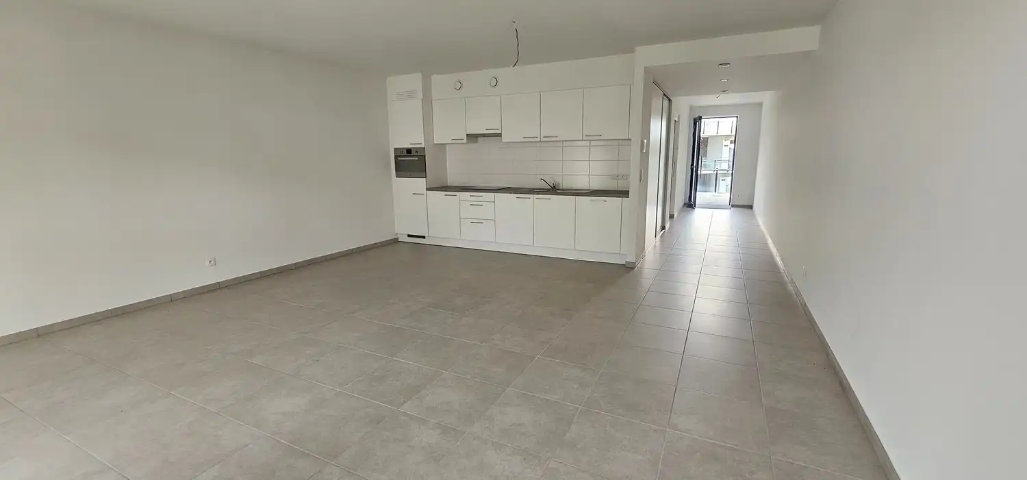 Nieuwbouwappartement met één slaapkamer gelegen in het commercieel centrum van Eisden. foto 4