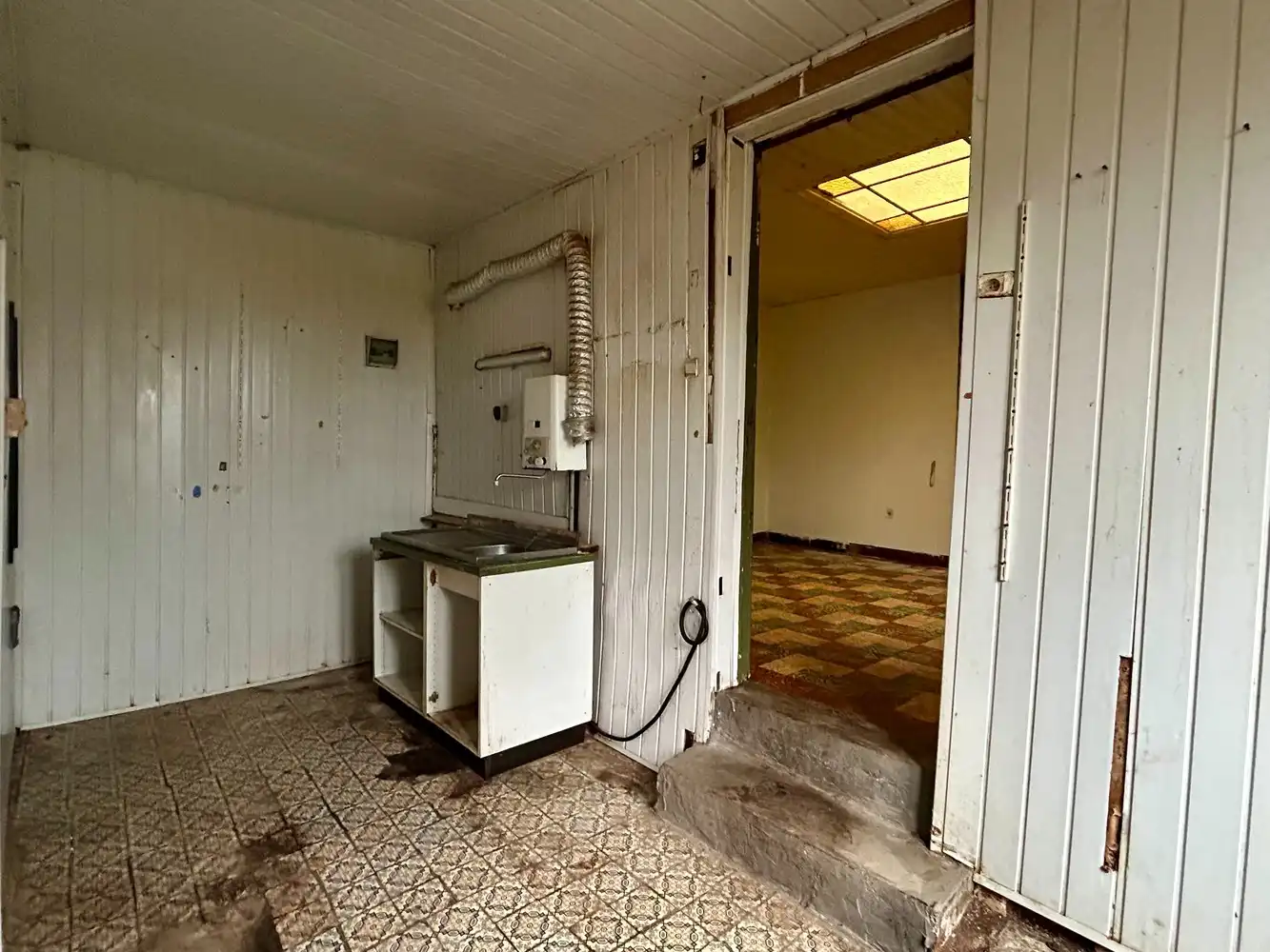 Te renoveren halfopen bebouwing met tuin - groot potentieel foto 8