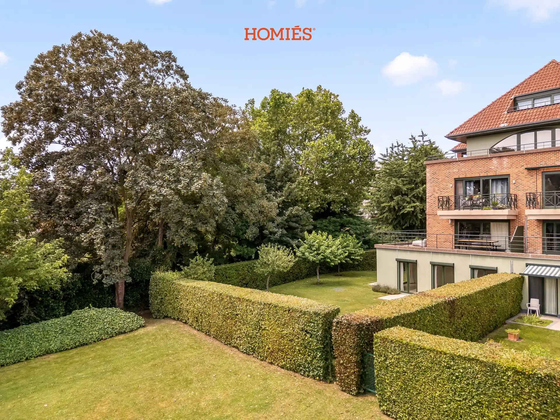 Ruim gelijkvloersappartement met zonnige privatieve tuin en veel privacy foto 14
