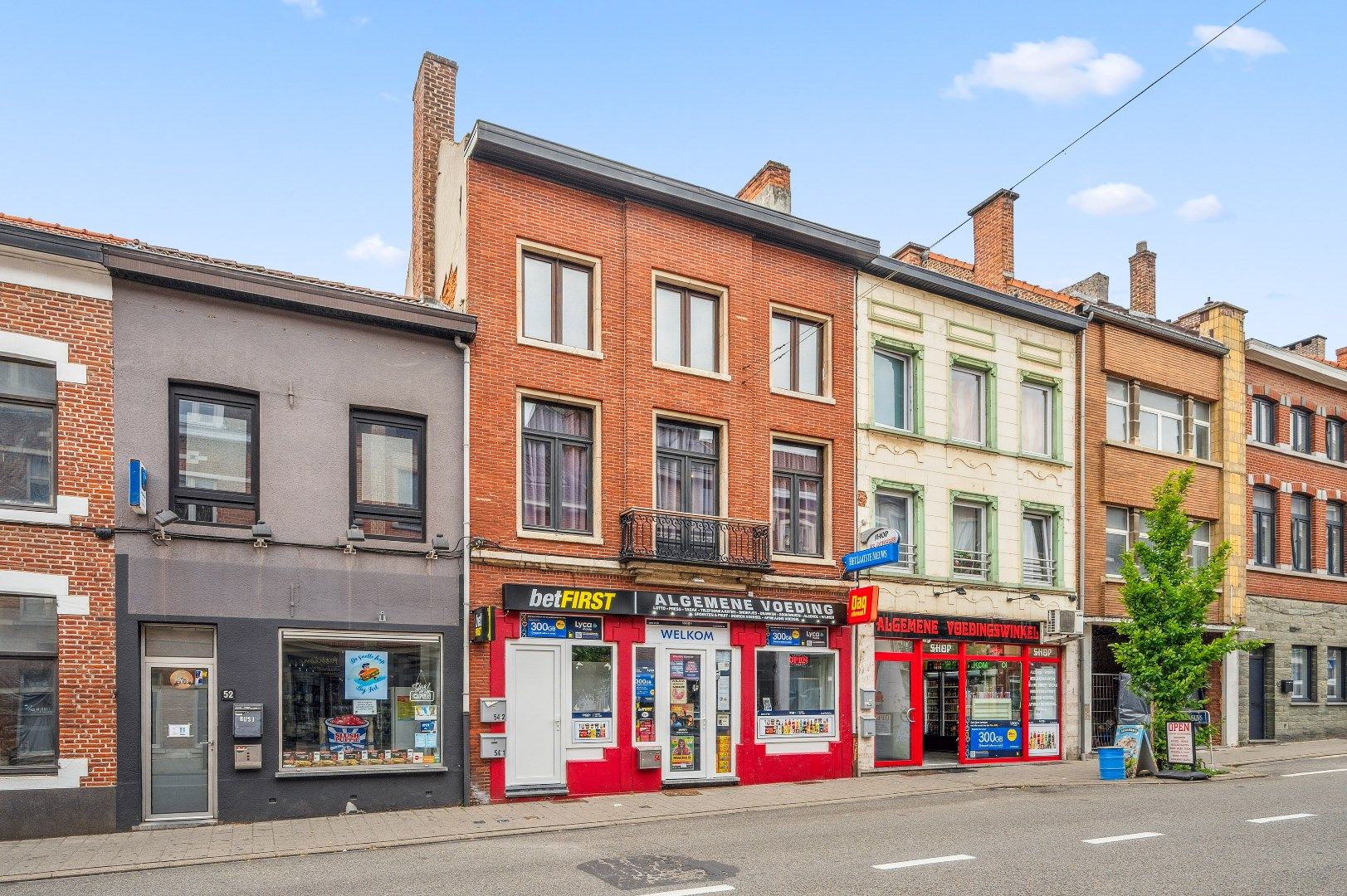 Opbrengsteigendom met 2 appartementen en een handelspand in het hart van Tienen foto 2