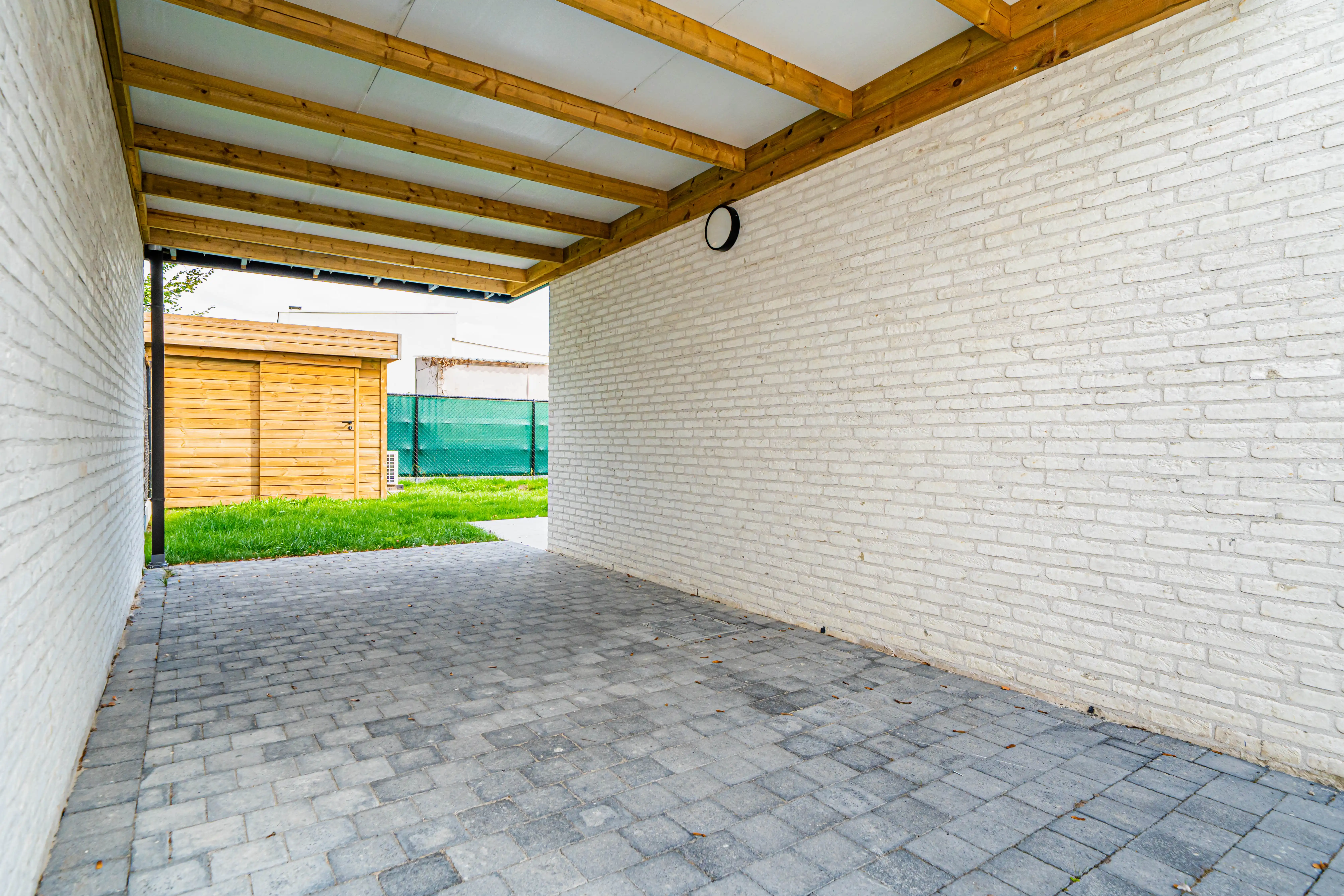 Nieuwbouwwoning met tuin en carport in Evergem foto 15