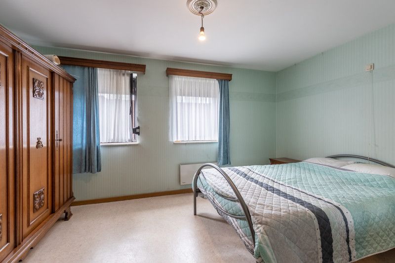 Gelijkvloers appartement met 2 slpkms, autostaanplaats en private berging foto 26