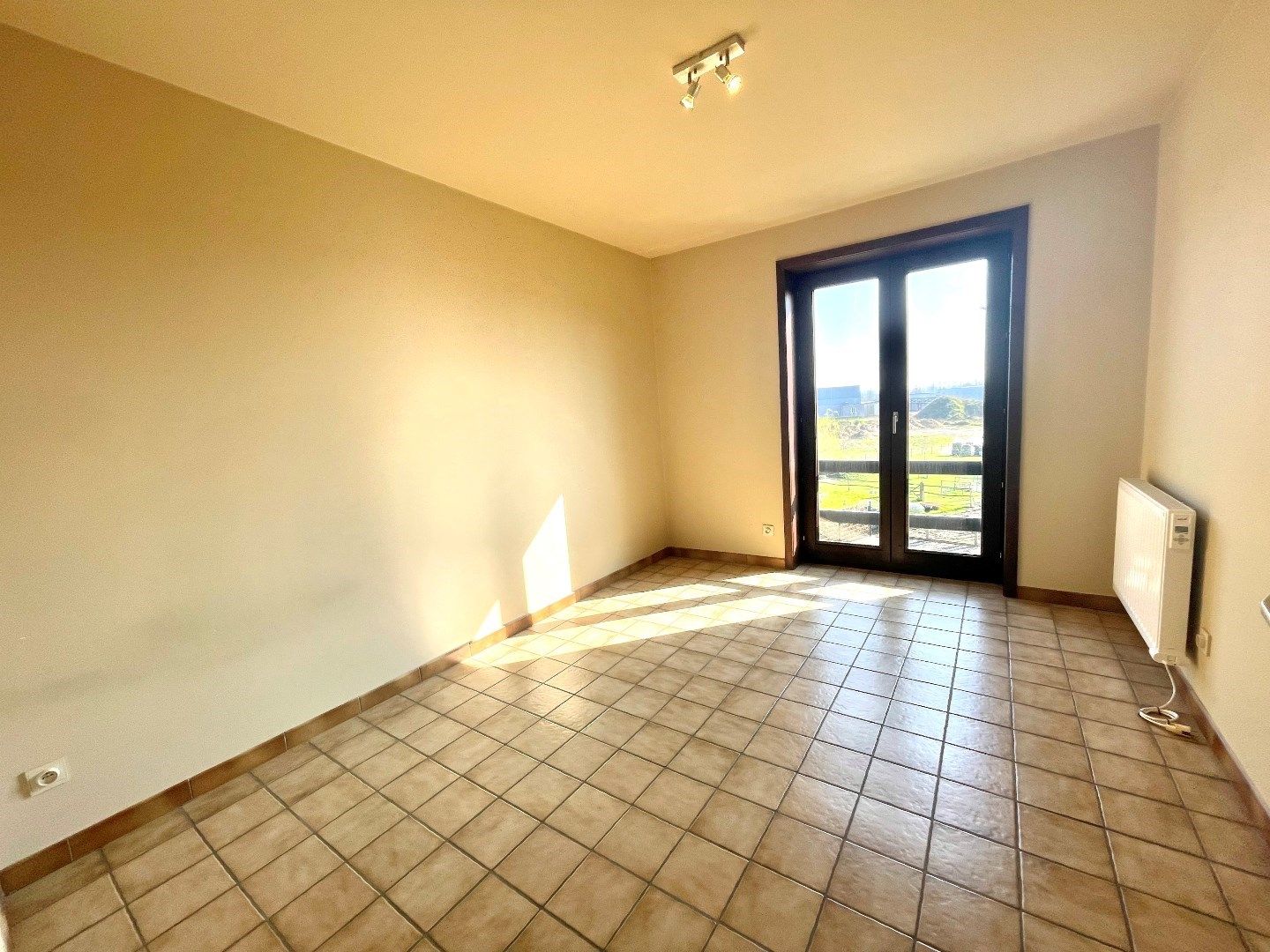 Ruim INSTAPKLAAR appartement te Oeselgem met 2 slaapkamers en GARAGE. foto 13