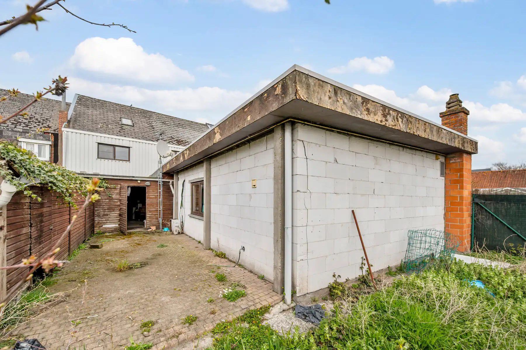 Opbrengsteigendom met 2 appartementen en handelsruimte foto 4