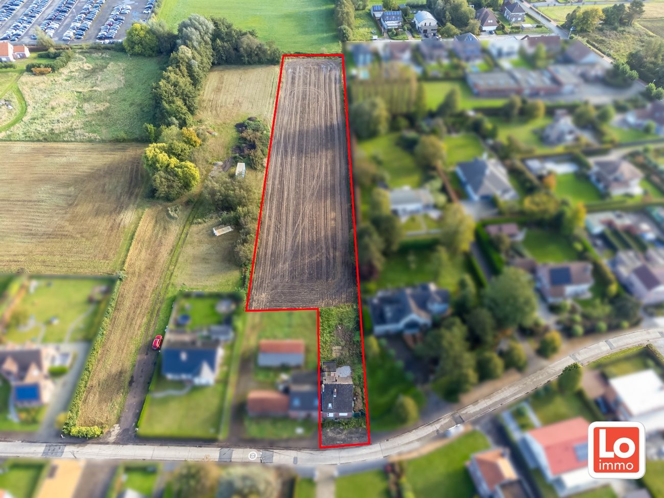 VERKOCHT! Mooi gelegen stuk bouwgrond met achteraan weide van in totaal 6039m² foto {{pictureIndex}}