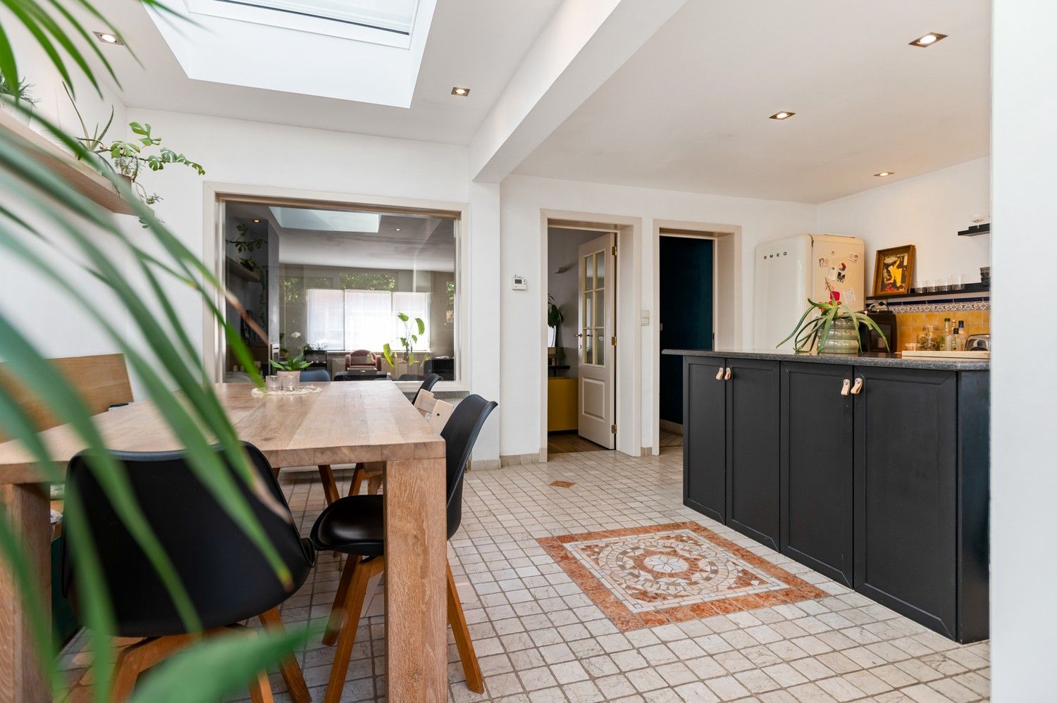 Instapklaar, ruim huis met 4 slaapkamers en tuin te koop in Schoten! foto 6
