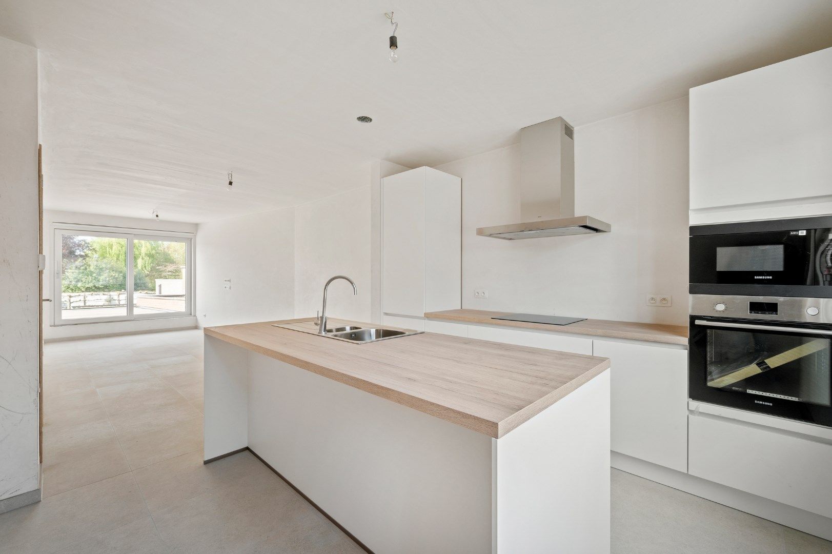 NIEUWBOUWAPPARTEMENTSGEBOUW BESTAANDE UIT 3 APPARTEMENTEN MET CARPORTS foto 4