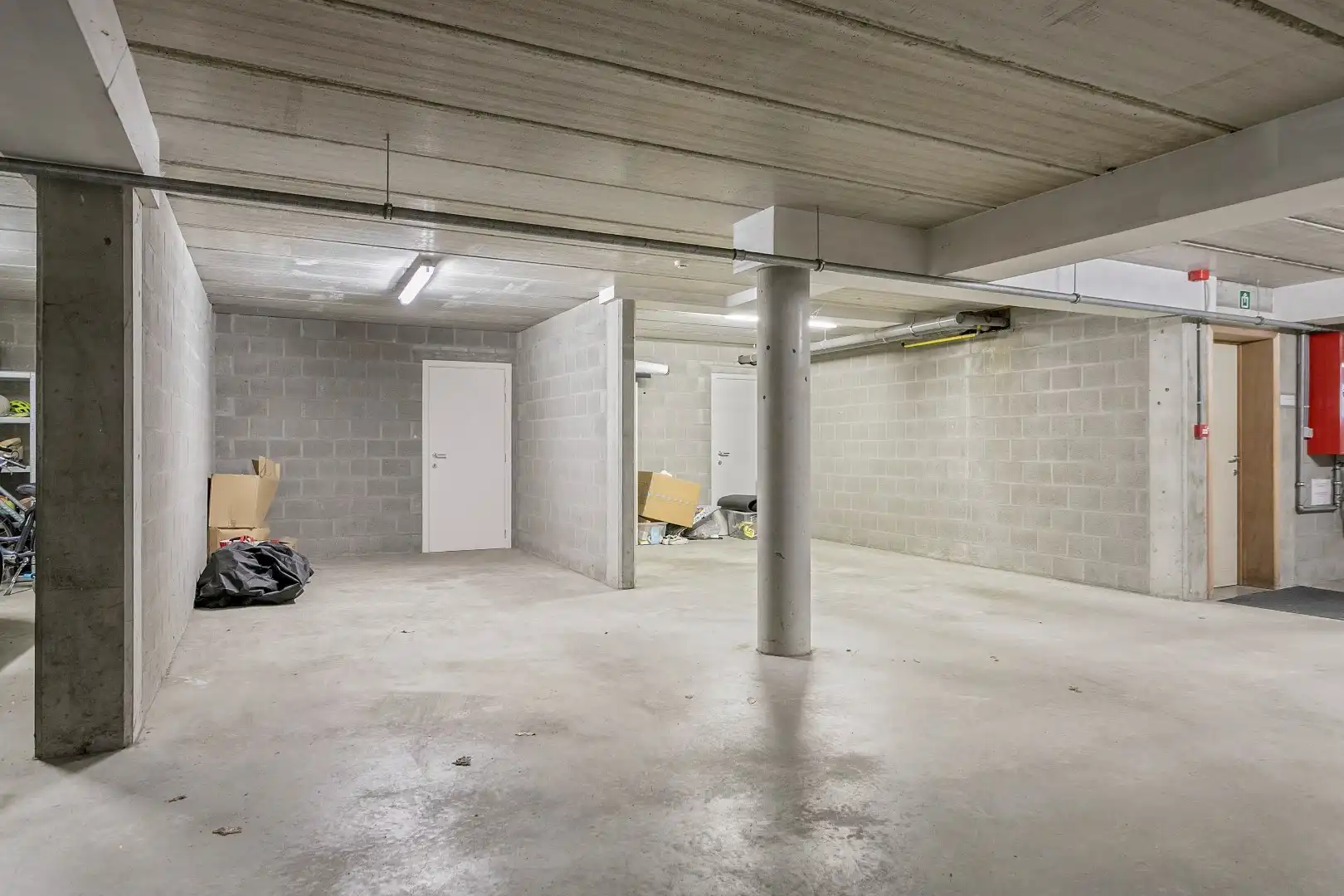 Modern, gelijkvloers appartement met 2 slpk, ondergrondse parking en tuin. foto 18