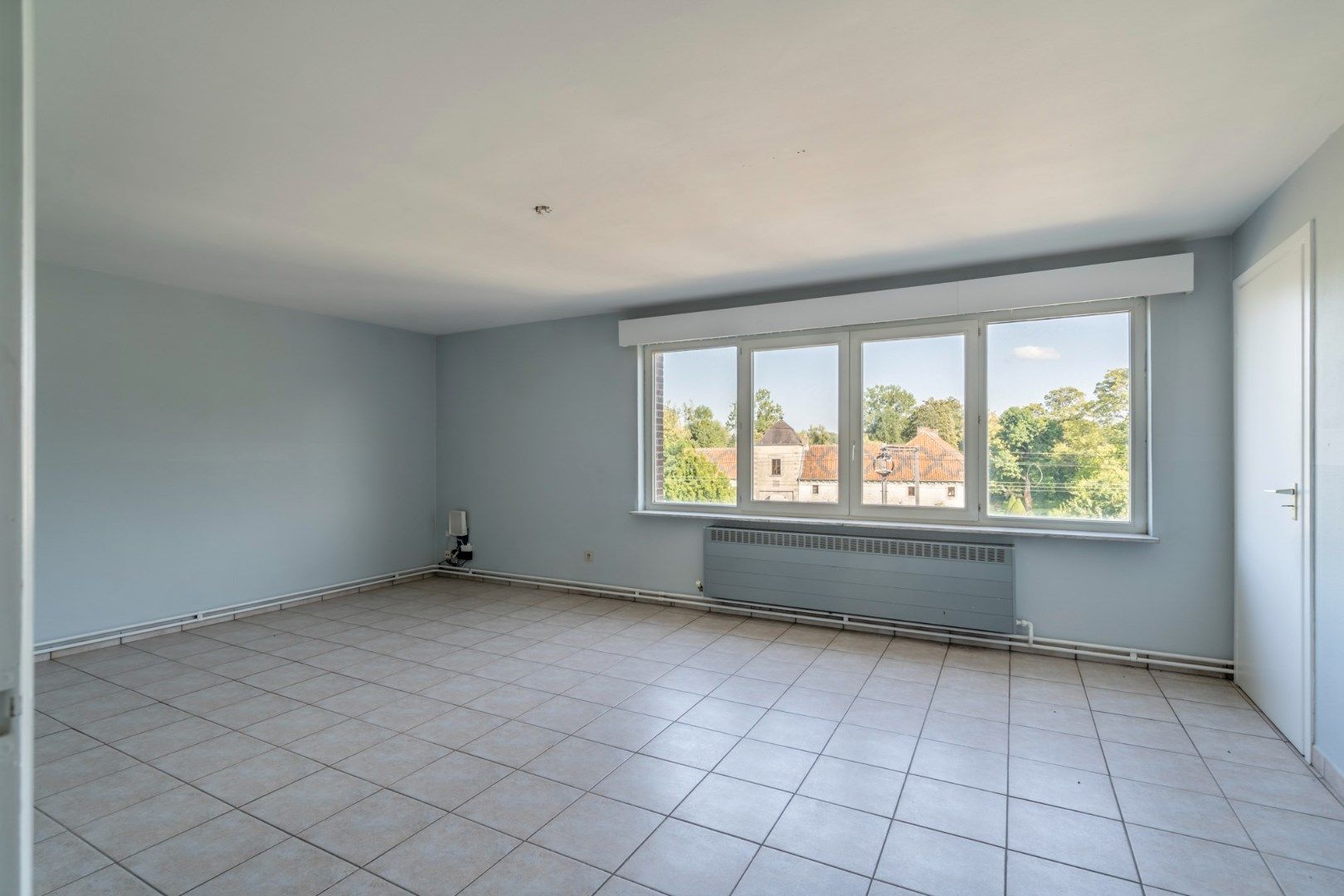 Te renoveren appartementsgebouw bestaande uit drie appartementen en een studio, vlakbij het centrum van Hoeselt foto 10