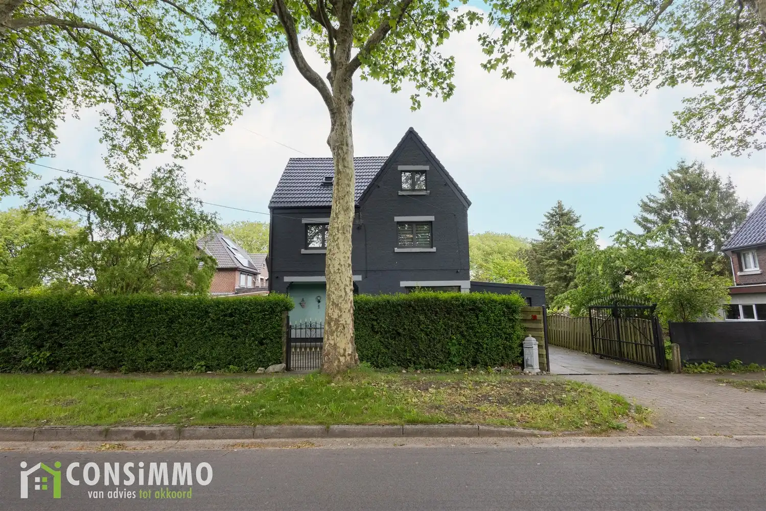 Vrijstaande karaktervolle mijnwoning in de tuinwijk van Waterschei foto 4