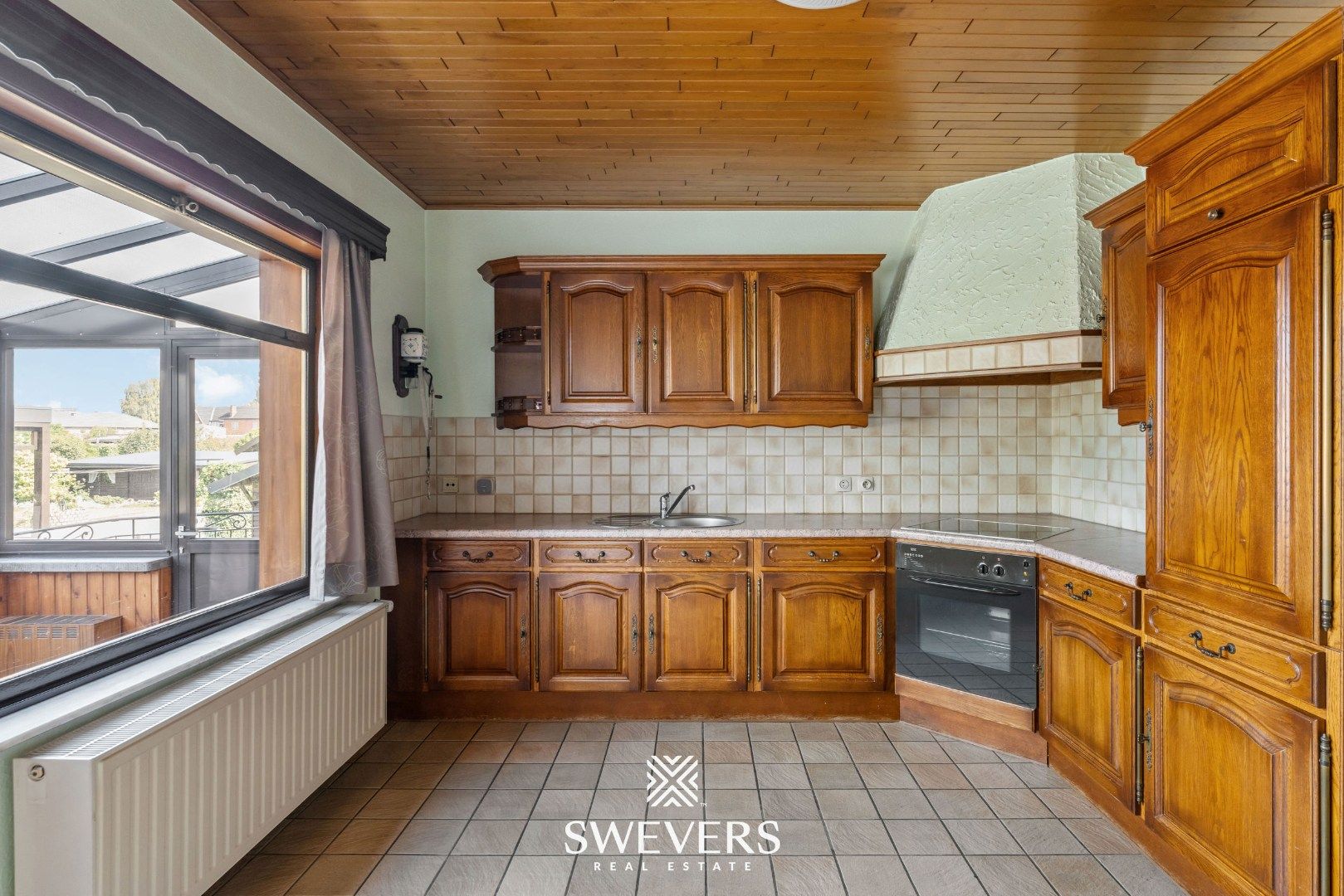 Ruime gezinswoning met renovatiepotentieel in Borgloon foto 13