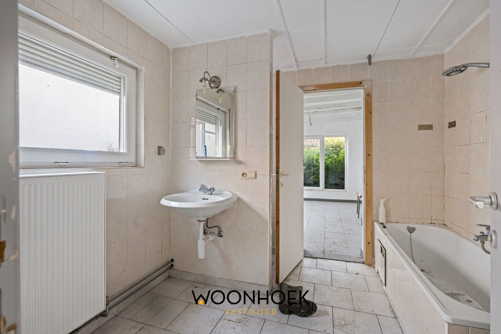 Te renoveren woning in centrum Overmere foto 6
